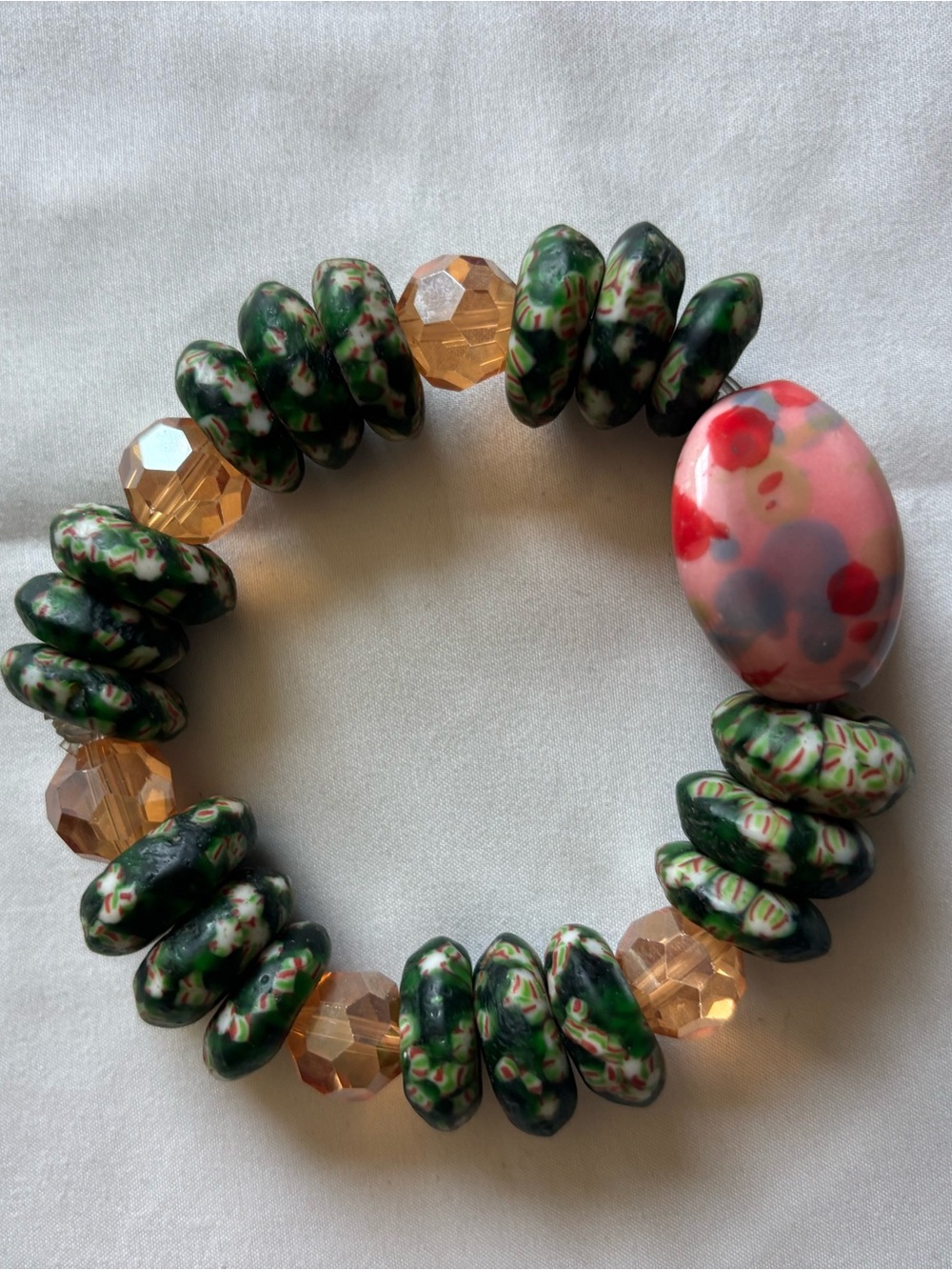 Green Millefiori Bead Stretch Bracelet with Pink Accent